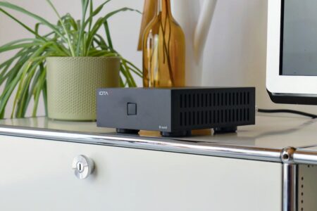 IOTAVX B:ound, viewed from the front at an angle on a sideboard